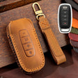 For Nissan Teana / Ariya 4-button Horn Hallmo Car Cowhide Leather Key Protective Cover Key Case(Brown) - Car Key Cases by Hallmo | Online Shopping South Africa | PMC TechLife | Buy Now Pay Later Mobicred