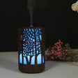 USB 200ml Hollow-out Forest Pattern Wooden Essential Oil Aromatherapy Machine Ultrasonic Humidifier Automatic Alcohol Sprayer(Dark Brown-3) - free shipping - PMC TechLife - Order now!