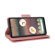 For Google Pixel 6a Rivet Buckle 9 Cards Three Fold Leather Phone Case(Rose Gold)