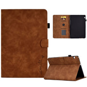 For Huawei MediaPad T5 Embossed Smile Flip Tablet Leather Case(Brown)