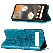 For Google Pixel 7a Embossed Butterfly Flip Leather Phone Case(Blue)