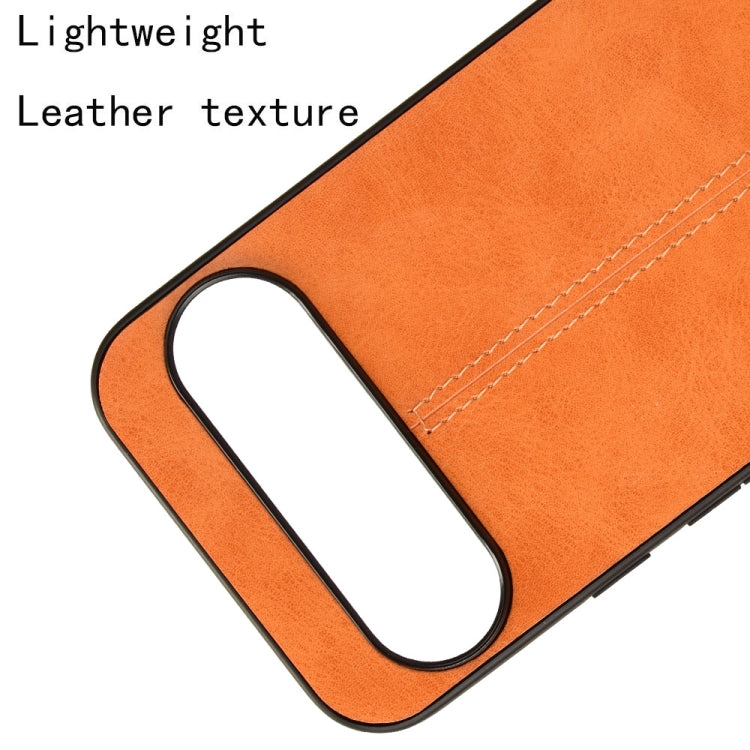 For Google Pixel 9 Sewing Cow Pattern Skin PC + PU + TPU Phone Case(Orange)