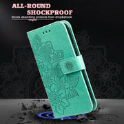 For Honor Magic6 Pro Seven-petal Flowers Embossing Leather Phone Case(Green)