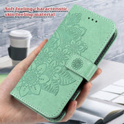 For Xiaomi Redmi K70E 7-petal Flowers Embossing Leather Phone Case(Green)