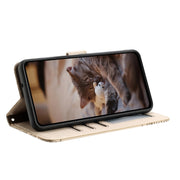 For iPhone 16 Pro Cat Embossing Pattern Leather Phone Case with Lanyard(Beige)