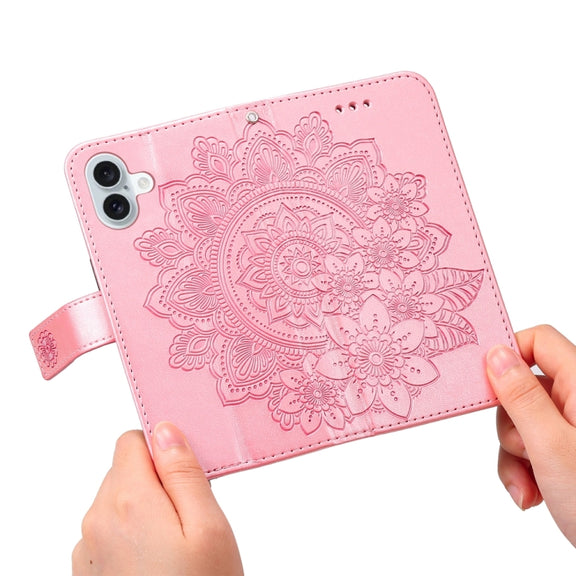 For iPhone 16 Plus 7-petal Flowers Embossing Leather Phone Case(Rose Gold)