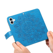 For iPhone 16 Plus Seven-petal Flowers Embossing Leather Phone Case(Blue)