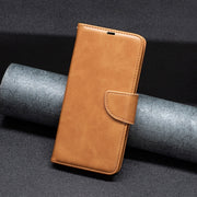 For iPhone 16 Lambskin Texture Pure Color Flip Leather Phone Case(Yellow)