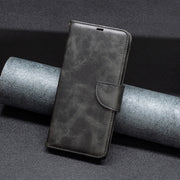 For iPhone 16 Lambskin Texture Pure Color Flip Leather Phone Case(Black)