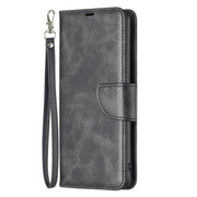 For iPhone 16 Lambskin Texture Pure Color Flip Leather Phone Case(Black)