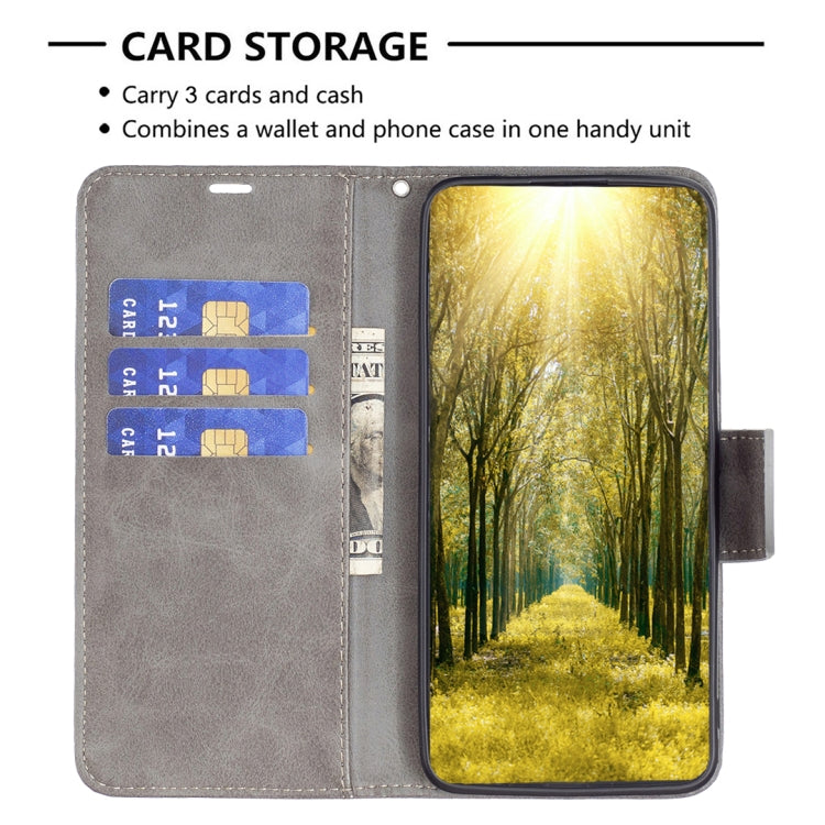 For iPhone 16 Plus Lambskin Texture Pure Color Flip Leather Phone Case(Grey)