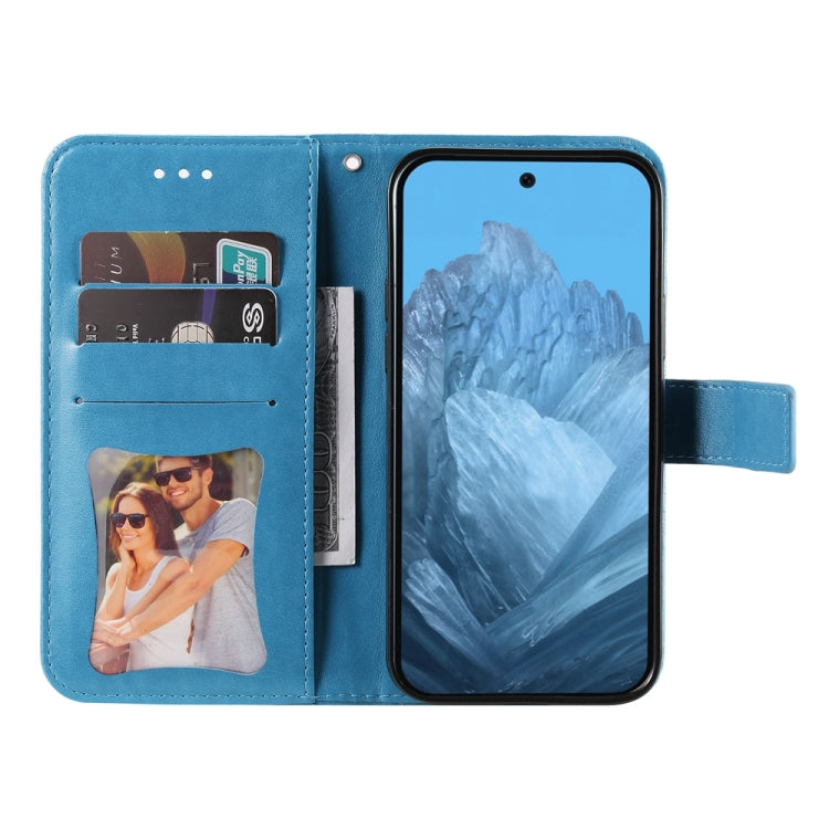 For Google Pixel 9 7-petal Flowers Embossing Leather Phone Case(Blue)