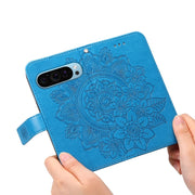 For Google Pixel 9 7-petal Flowers Embossing Leather Phone Case(Blue)