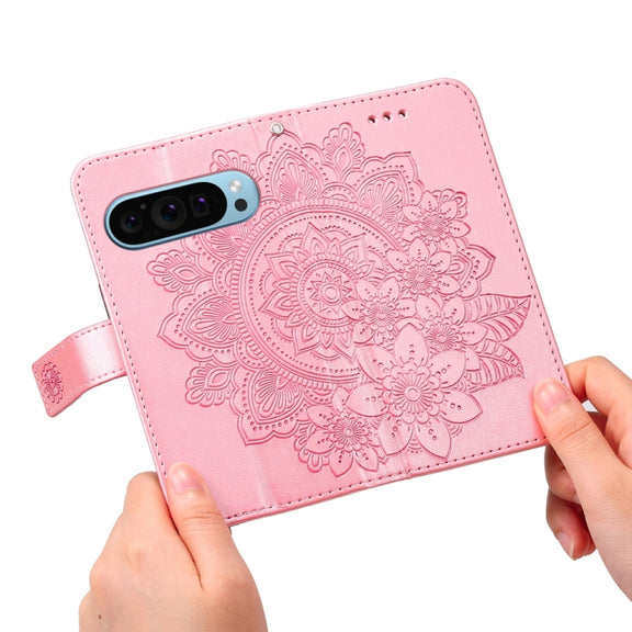 For Google Pixel 9 7-petal Flowers Embossing Leather Phone Case(Rose Gold)