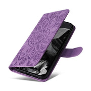 For Google Pixel 9 Pro Embossed Sunflower Leather Phone Case(Purple)