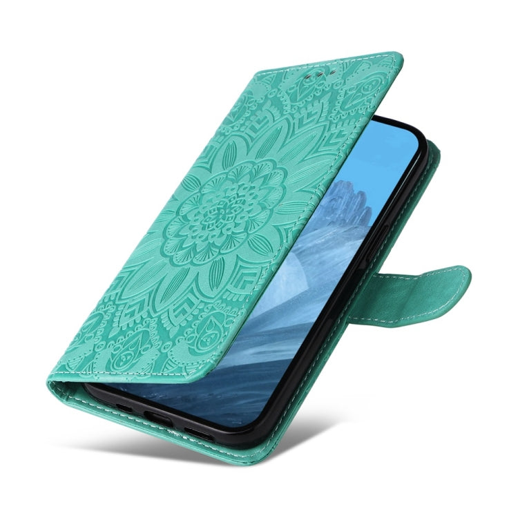 For Google Pixel 9 Embossed Sunflower Leather Phone Case(Green)