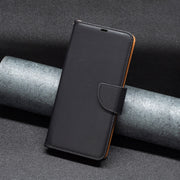 For iPhone 16 Litchi Texture Pure Color Flip Leather Phone Case(Black)