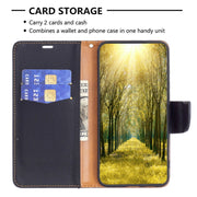 For iPhone 16 Litchi Texture Pure Color Flip Leather Phone Case(Black)
