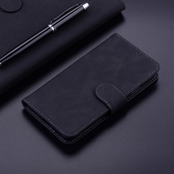 For iPhone 16e Skin Feel Pure Color Flip Leather Phone Case(Black)