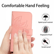 For Google Pixel 9 Skin Feel Sun Flower Embossed Flip Leather Phone Case with Lanyard(Pink)