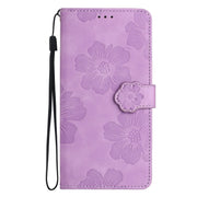 For iPhone 16 Flower Embossing Pattern Leather Phone Case(Purple)