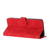 For iPhone 16e Flower Embossing Pattern Leather Phone Case(Red)