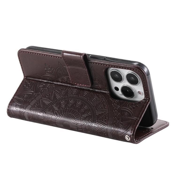 For iPhone 16 Pro Max Totem Flower Embossed Leather Phone Case(Brown)