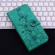 For iPhone 16 Lily Embossed Leather Phone Case(Green)