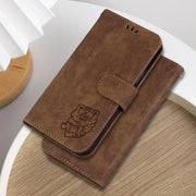For Google Pixel 9 Pro Little Tiger Embossed Leather Phone Case(Brown)