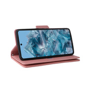 For Google Pixel 8a Rivet Buckle 9 Cards Three Fold Leather Phone Case(Rose Gold)