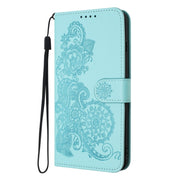 For Motorola Edge 5G 2024 Datura Flower Embossed Flip Leather Phone Case(Light Blue)