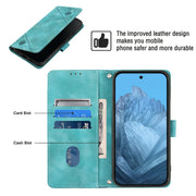 For Google Pixel 9 / 9 Pro Skin-feel Embossed Leather Phone Case(Green)