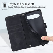 For Google Pixel 9 / 9 Pro Skin-feel Embossed Leather Phone Case(Black)