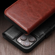 For iPhone 15 Pro Max QIALINO Classic 103 Buckle Genuine Leather Phone Case(Black)