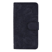 For iPhone 16 Mandala Embossed Dual-Fold Calf Leather Phone Case(Black)