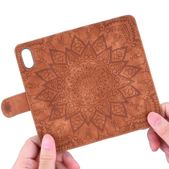 For iPhone 16e Mandala Embossed Dual-Fold Calf Leather Phone Case(Brown)