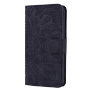 For iPhone 16e Mandala Embossed Dual-Fold Calf Leather Phone Case(Black)
