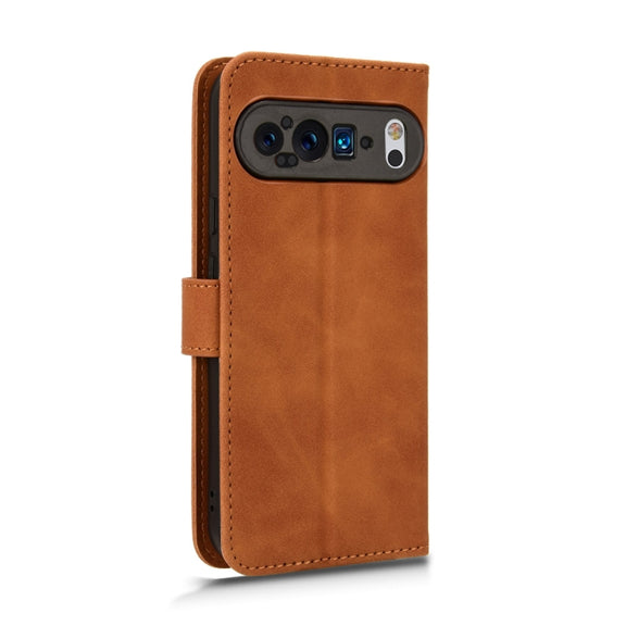 For Google Pixel 9 Pro Skin Feel Magnetic Flip Leather Phone Case(Brown)