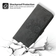 For Google Pixel 9 Skin-feel Flowers Embossed Wallet Leather Phone Case(Black)