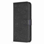 For Xiaomi Redmi Note 12 4G Global Four-leaf Embossed Leather Phone Case(Black)