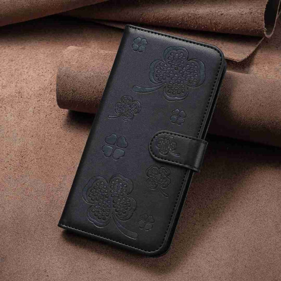For Xiaomi Redmi Note 12 4G Global Four-leaf Embossed Leather Phone Case(Black)