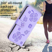 For Xiaomi Redmi Note 12 Pro 5G Global Four-leaf Embossed Leather Phone Case(Purple)