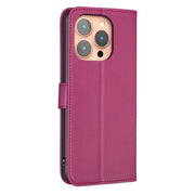 For iPhone 16 Pro Max Four-leaf Embossed Leather Phone Case(Rose Red)