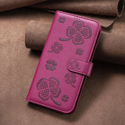 For iPhone 16 Four-leaf Embossed Leather Phone Case(Rose Red)