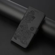 For Google Pixel 9 Pro Datura Flower Embossed Flip Leather Phone Case(Black)