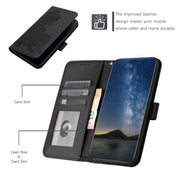 For Google Pixel 9 Pro Datura Flower Embossed Flip Leather Phone Case(Black)