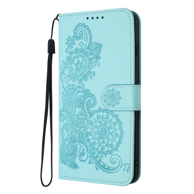 For Google Pixel 9 Datura Flower Embossed Flip Leather Phone Case(Light blue)