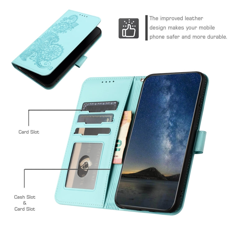 For Google Pixel 9 Datura Flower Embossed Flip Leather Phone Case(Light blue)