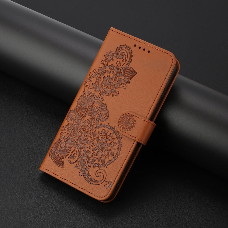 For Google Pixel 9 Datura Flower Embossed Flip Leather Phone Case(Brown)