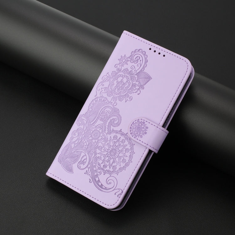 For Google Pixel 9 Datura Flower Embossed Flip Leather Phone Case(Purple)